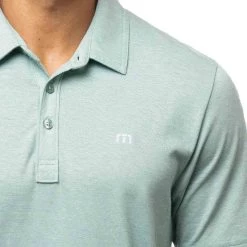 TravisMathew The Zinna Polo -Golf Equipment Shop travismathew 2023 the zinna polo heather bearl green logo itempicture